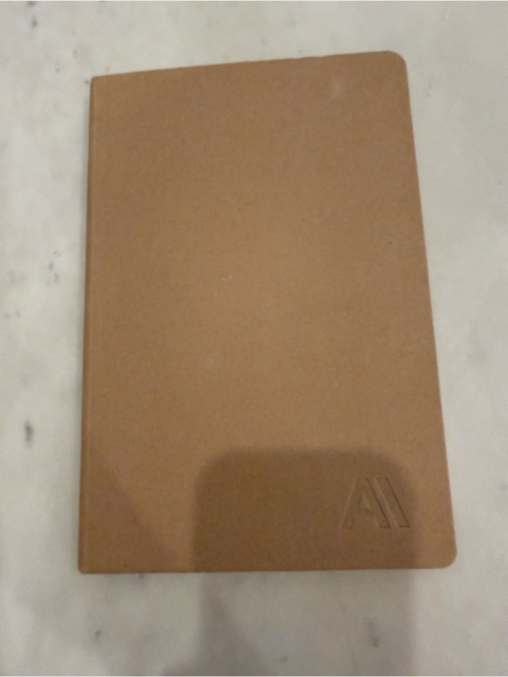 Brown Embossed Moleskine-Style Notebook